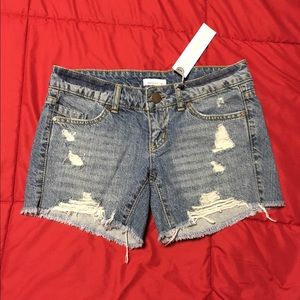 Distressed denim shorts